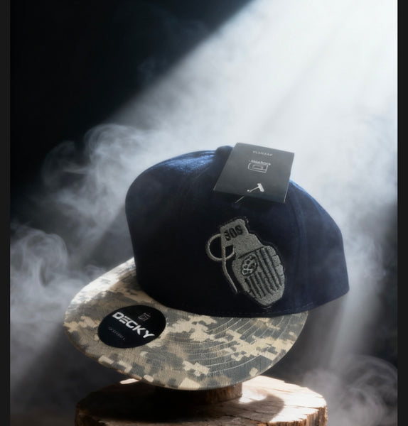 SUPPORT OUR SOLDIERS (S.O.S.) SNAPBACK HAT.                 Black hat with green digital camo brim..