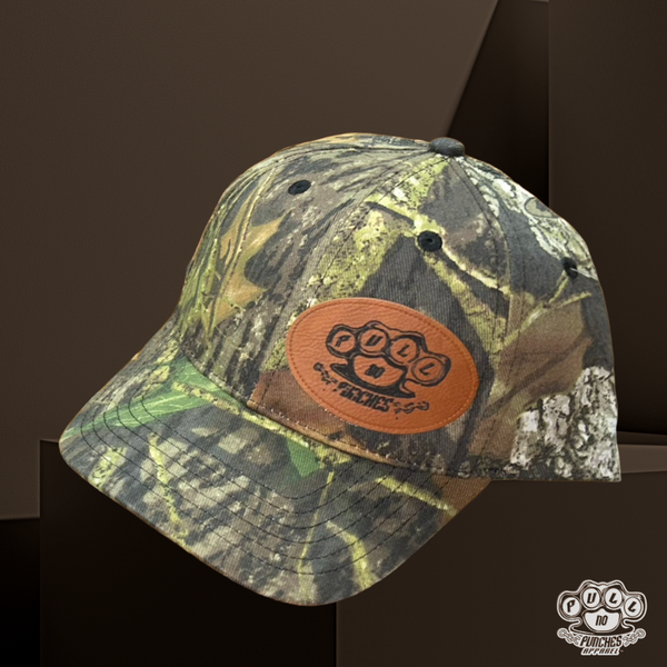 MOSSY OAK SNAP BACK WITH LEATHER PATCH.